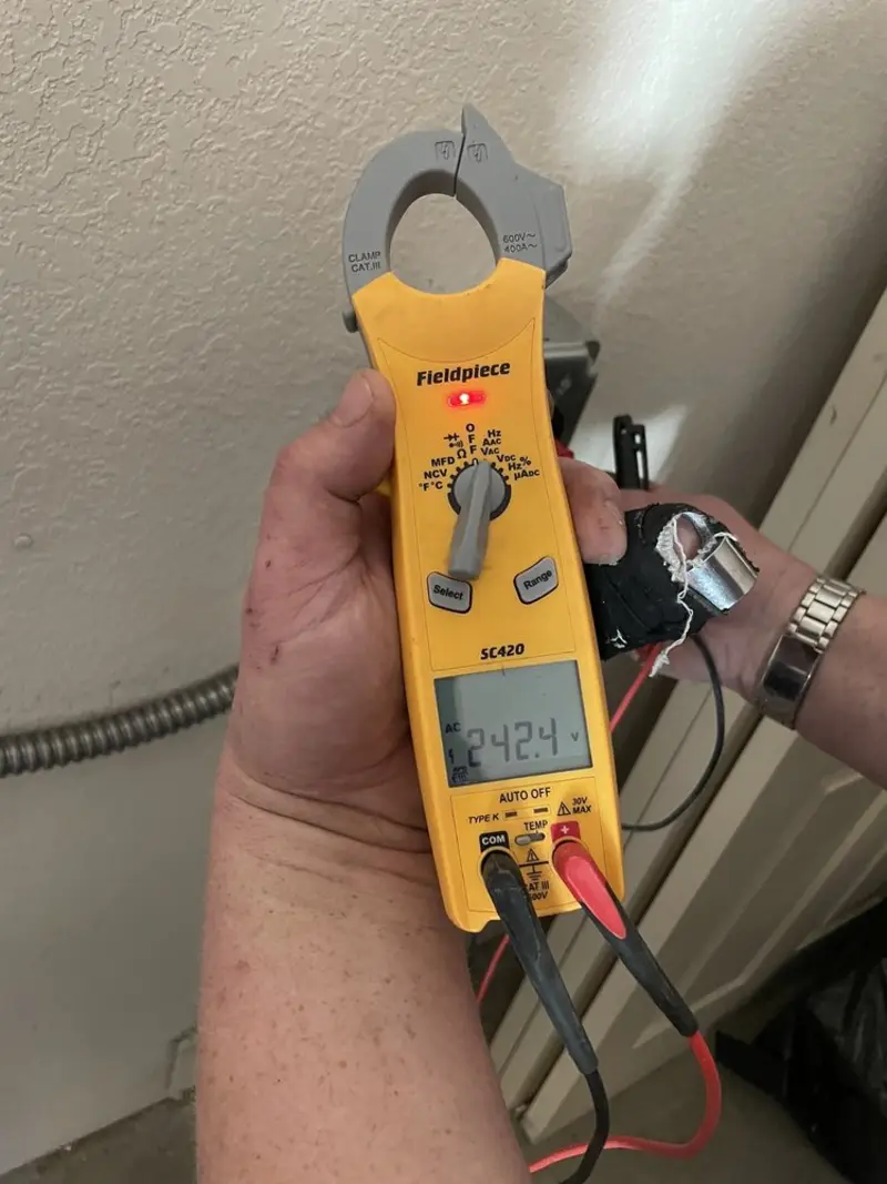 Voltage testing with clamp meter during Generator Installation in Union Park